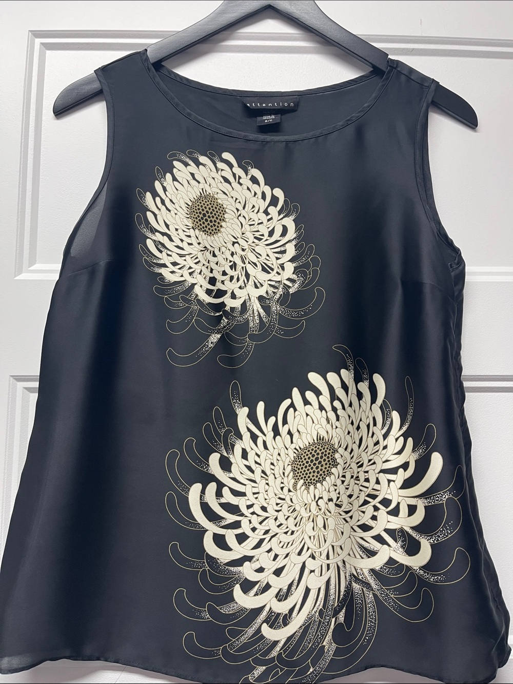 attention Black Satin Sleeveless Top with Cream Floral Motif